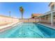 Sparkling pool with an inviting backyard setting and relaxing ambiance at 9339 Bondeno St, Las Vegas, NV 89123