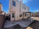 The home features a backyard with concrete patio and shaded area at 1001 Padre Island St, Las Vegas, NV 89128