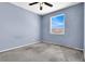 Cozy bedroom featuring a ceiling fan and a window with natural light at 1001 Padre Island St, Las Vegas, NV 89128