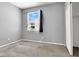 A bedroom featuring a closet and window, offers lots of potential at 1001 Padre Island St, Las Vegas, NV 89128