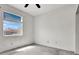 Light-filled bedroom showcasing a window with views of the neighborhood at 1001 Padre Island St, Las Vegas, NV 89128