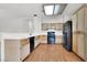 Functional kitchen featuring plenty of storage and laminate flooring at 1001 Padre Island St, Las Vegas, NV 89128