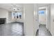 Open-concept living room featuring a cozy fireplace and a bathroom at 1001 Padre Island St, Las Vegas, NV 89128