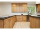 Bright kitchen featuring an expansive countertop space, custom cabinets, and stainless steel appliances at 10726 Hawes End Ct, Las Vegas, NV 89183