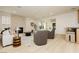 Bright living room with stylish decor, modern lighting and a decorative fireplace adding warmth and charm at 10726 Hawes End Ct, Las Vegas, NV 89183