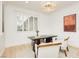 Bright office space featuring a modern light fixture, plantation shutters and neutral decor at 10726 Hawes End Ct, Las Vegas, NV 89183