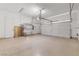 Spacious two-car garage with ample storage and an automatic door at 1111 Casa Palermo Cir, Henderson, NV 89011