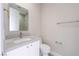 Modern bathroom featuring a sleek vanity with white cabinets and a stylish mirror at 11359 Winter Cottage Pl, Las Vegas, NV 89135