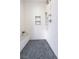 Shower room with a textured white tile surround, seating area and rainfall shower head at 11359 Winter Cottage Pl, Las Vegas, NV 89135