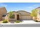 Attractive single-story home featuring desert landscaping and a two-car garage at 13 Deseo Ct, North Las Vegas, NV 89031