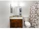 Bathroom featuring a vanity with granite counters, and a tub with shower at 1361 E University Ave # 106, Las Vegas, NV 89119
