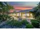 Beautiful backyard with desert landscaping and covered patio at 1805 Prichard Ave, Henderson, NV 89052