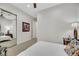 Comfortable bedroom with a mirrored closet, plush bed, ceiling fan, and stylish decor, creating an inviting space at 1805 Prichard Ave, Henderson, NV 89052