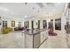 Gourmet kitchen features granite countertops, stainless appliances, and an island with pendant lighting at 1805 Prichard Ave, Henderson, NV 89052