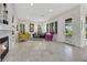 Stylish living room with fireplace, modern decor, and access to the backyard at 1805 Prichard Ave, Henderson, NV 89052