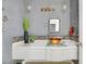 Elegant powder room featuring a copper sink, decorative lighting, and grass decoration, blending style and nature at 1805 Prichard Ave, Henderson, NV 89052