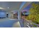 Spacious balcony offers serene views of the landscaped backyard and twilight sky, perfect for relaxing at 2208 Point Rock Ln, Las Vegas, NV 89134