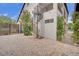 Stunning home featuring a unique spiral staircase leading to the upper level and a well-maintained gravel yard at 2208 Point Rock Ln, Las Vegas, NV 89134