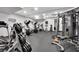 Home gym featuring weights, elliptical machines, treadmills, and weightlifting equipment at 2208 Point Rock Ln, Las Vegas, NV 89134
