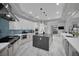 Spacious kitchen with island, stainless steel appliances, modern cabinetry and lots of counter space at 2208 Point Rock Ln, Las Vegas, NV 89134