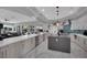 Spacious kitchen features modern stainless appliances, an island, and plenty of counter space at 2208 Point Rock Ln, Las Vegas, NV 89134