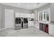 Laundry room featuring side-by-side washer and dryer, storage, and natural light at 2208 Point Rock Ln, Las Vegas, NV 89134