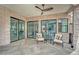 Inviting outdoor patio with lounge area and fireplace at 2208 Point Rock Ln, Las Vegas, NV 89134
