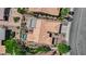 Aerial view showcases the backyard layout with a pool, spa, patio and desert landscaping at 2232 Beacon Ridge Dr, Las Vegas, NV 89134