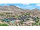 This aerial showcases the community amenities, including tennis courts, pool, baseball field, parking, and more at 2232 Beacon Ridge Dr, Las Vegas, NV 89134