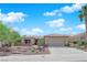 Charming single-story home with a well-manicured xeriscaped yard and beautiful desert landscaping at 2232 Beacon Ridge Dr, Las Vegas, NV 89134