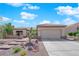 Welcoming single-story home with mature desert landscaping and a spacious two-car garage at 2232 Beacon Ridge Dr, Las Vegas, NV 89134