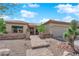 Charming home featuring desert landscaping, brick walkway, and inviting front entrance at 2232 Beacon Ridge Dr, Las Vegas, NV 89134