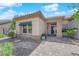 Close up of charming home featuring desert landscaping, brick walkway, and inviting front entrance at 2232 Beacon Ridge Dr, Las Vegas, NV 89134
