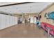 Spacious garage with epoxy flooring, plenty of storage and space for multiple vehicles at 2232 Beacon Ridge Dr, Las Vegas, NV 89134