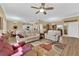 Spacious living room featuring hardwood floors, neutral decor, and open concept design at 2232 Beacon Ridge Dr, Las Vegas, NV 89134