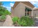 Beautiful home featuring desert landscaping and a brick walkway along the side yard at 2232 Beacon Ridge Dr, Las Vegas, NV 89134