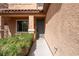 View of the front door and entryway with a small garden and walkway at 2532 Bechamel Pl, Henderson, NV 89044