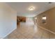 View of an open living space with tile floors and lots of natural light at 2532 Bechamel Pl, Henderson, NV 89044