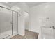 A bathroom features a walk-in shower and separate soaking tub at 2555 Hampton Rd # 10104, Henderson, NV 89052