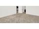Bedroom with plush carpeting and an open doorway leading to other rooms in the home at 2555 Hampton Rd # 10104, Henderson, NV 89052