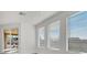 Bright living room features a sliding door to the patio and natural light at 2555 Hampton Rd # 10104, Henderson, NV 89052