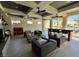 Inviting outdoor lounge with comfortable seating, ceiling fans, and a view of the sparkling pool area at 2555 Hampton Rd # 10104, Henderson, NV 89052