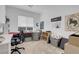 Bedroom with window, neutral walls, carpet and decorations at 272 Mount Steele Ave, Henderson, NV 89015