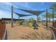 A neighborhood park's playground features various play structures and sun shade at 272 Mount Steele Ave, Henderson, NV 89015