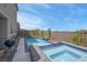 An inviting backyard pool and spa create a perfect outdoor oasis at 272 Mount Steele Ave, Henderson, NV 89015