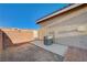 Cozy backyard featuring a small patio area, perfect for enjoying outdoor activities or adding personal touches at 2852 Red Ct, Las Vegas, NV 89123