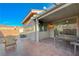 Covered patio and outdoor seating area with a view of the block wall at 2852 Red Ct, Las Vegas, NV 89123