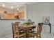 Bright dining area adjacent to the kitchen, featuring tile flooring and a cozy, inviting atmosphere at 2852 Red Ct, Las Vegas, NV 89123