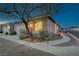 Charming single-story home with a well-maintained garage, lush landscaping, and inviting curb appeal at 2852 Red Ct, Las Vegas, NV 89123