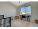 Bright office space with tiled floors, a work desk and a view of the neighborhood at 2852 Red Ct, Las Vegas, NV 89123